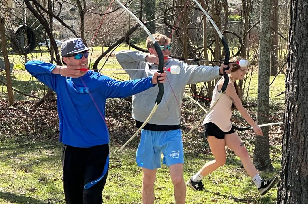 picture of ASU Three Rivers students practicing archery
