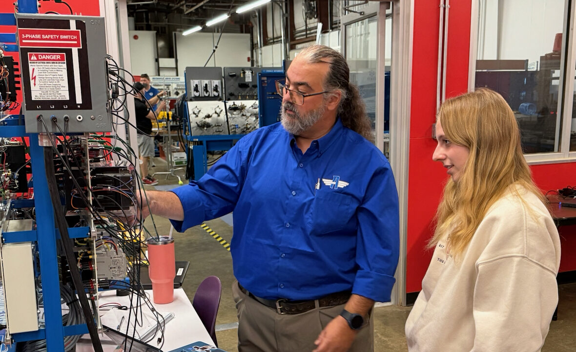picture of ASU-Newport advanced manufacturing technology faculty and student