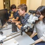 Picture of A-State engineering students working in a university laboratory.