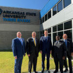 Picture of trustees at ribbon-cutting ceremony for new nursing building at ASU Three Rivers