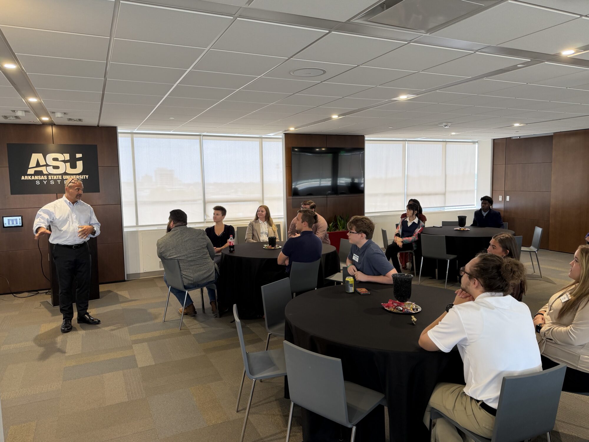 ASU System President Todd Shields speaks with Leadership Institute participants at ASU System Office
